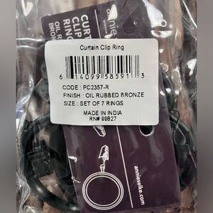 2 sets of curtain clip rings.  Bronze.